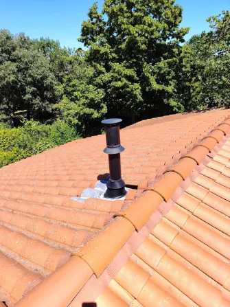 Ramonage conduit en toiture